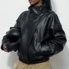 grok-image-0b872fea-1b69-4691-b45a-9c061893408c The Nova Jacket – Women’s Oversized Faux Leather Jacket – Minimalist Streetwear
