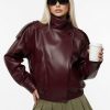 grok-image-1bb8e266-0b6e-4919-96ab-e111596e3b2c The Nova Jacket – Women’s Oversized Faux Leather Jacket – Minimalist Streetwear