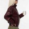 grok-image-4bbb1bf5-6072-4c43-9c61-46e8b5042797 The Nova Jacket – Women’s Oversized Faux Leather Jacket – Minimalist Streetwear