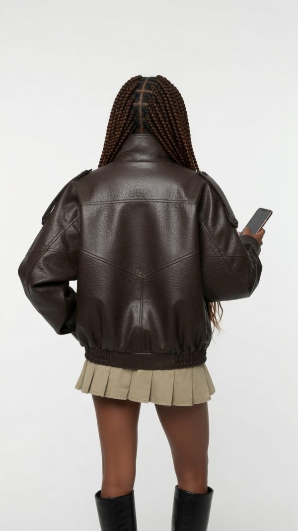 grok-image-9587e513-e9e1-4b3b-be39-72a179b9a2d5 The Nova Jacket – Women’s Oversized Faux Leather Jacket – Minimalist Streetwear