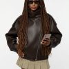 grok-image-b455f3ca-8fa9-4eba-b0e5-f06bbed1da22 The Nova Jacket – Women’s Oversized Faux Leather Jacket – Minimalist Streetwear