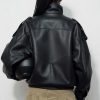 grok-image-cdf8587c-4922-4eda-a1bf-b4aeeaf16f47 The Nova Jacket – Women’s Oversized Faux Leather Jacket – Minimalist Streetwear